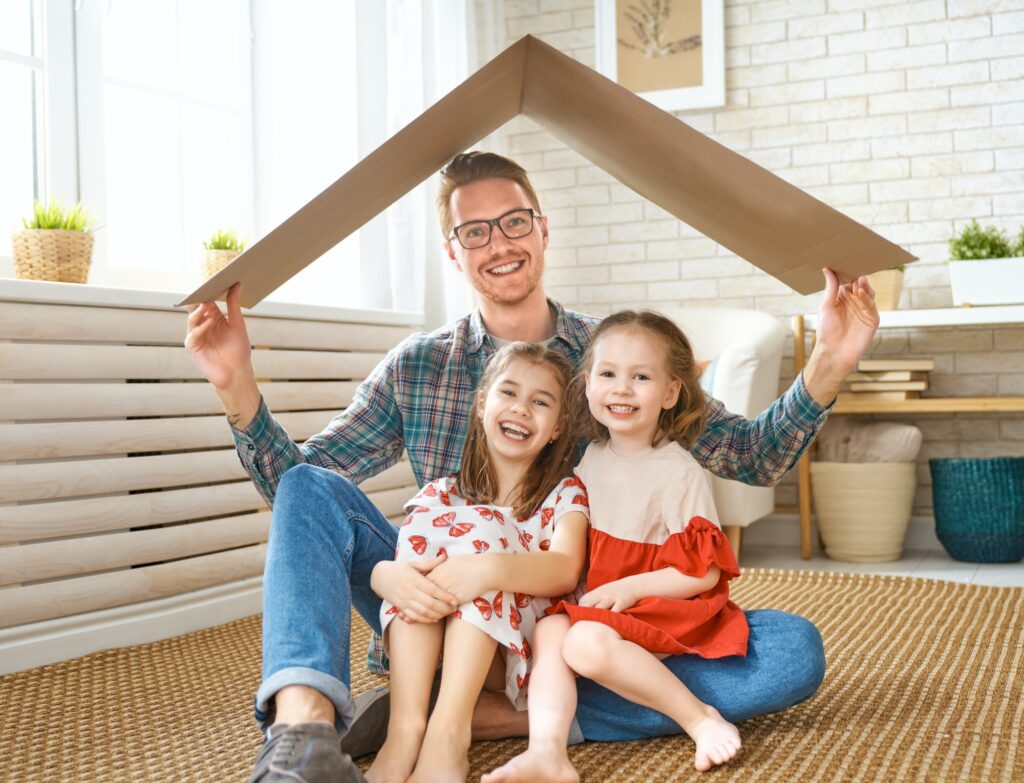 Father and children with a symbol of roof.
